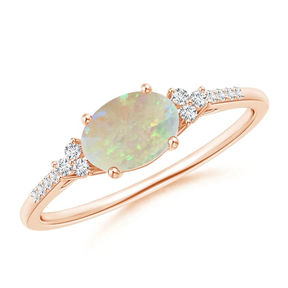 Horizontally Set Oval Opal Ring with Trio Diamonds